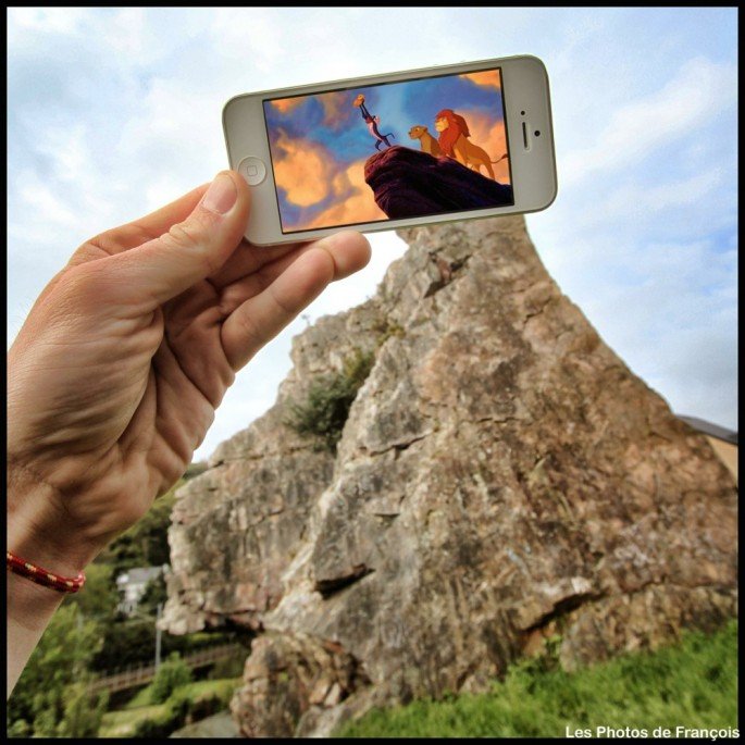 iPhone held up in front of perfect real-life backgrounds 9